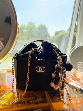 Milk Makeup Black Quilted Drawstring Crossbody with Gold Chain & Charm